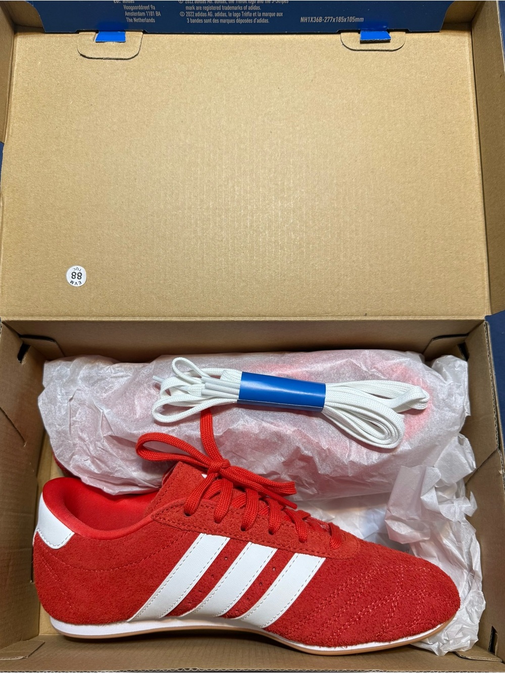 adidas Red Sneakers with White Stripes